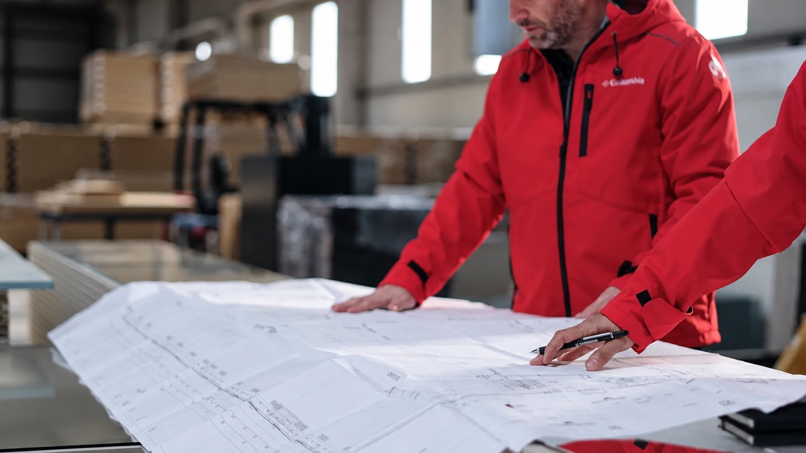 Gerhman engineering team reviewing drawings and project requirements.