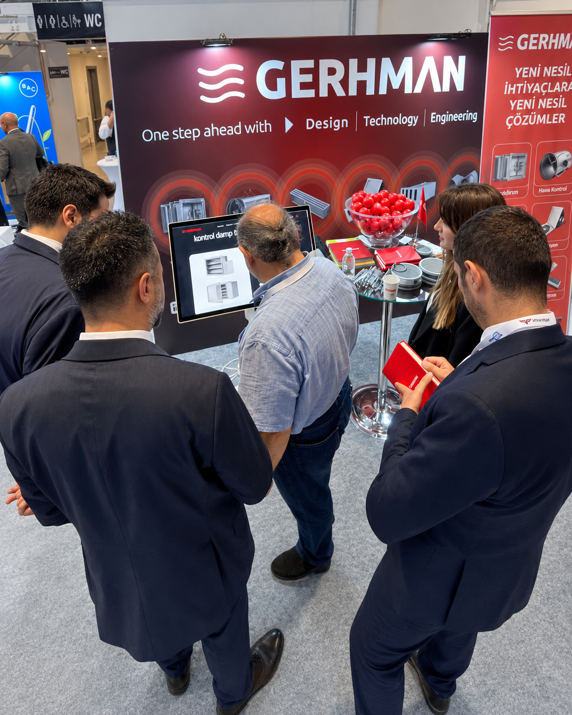 Introducing products to visitors at the Gerhman stand.
